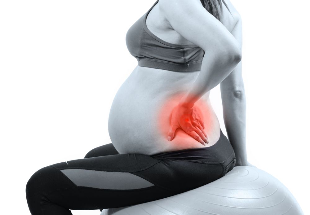 Pregnancy and Postnatal Back Pain: A Physio's Practical Guide Through Pregnancy and the First Year After Birth