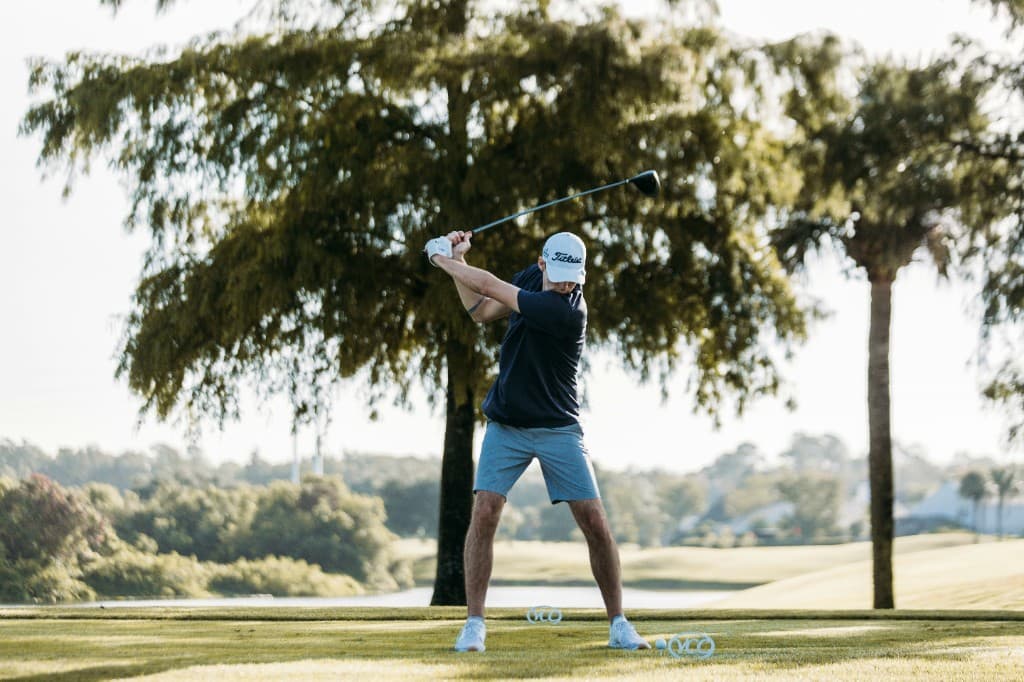 Driving Range Low Back Pain: Why a Bucket of Balls Beats Up Your Spine